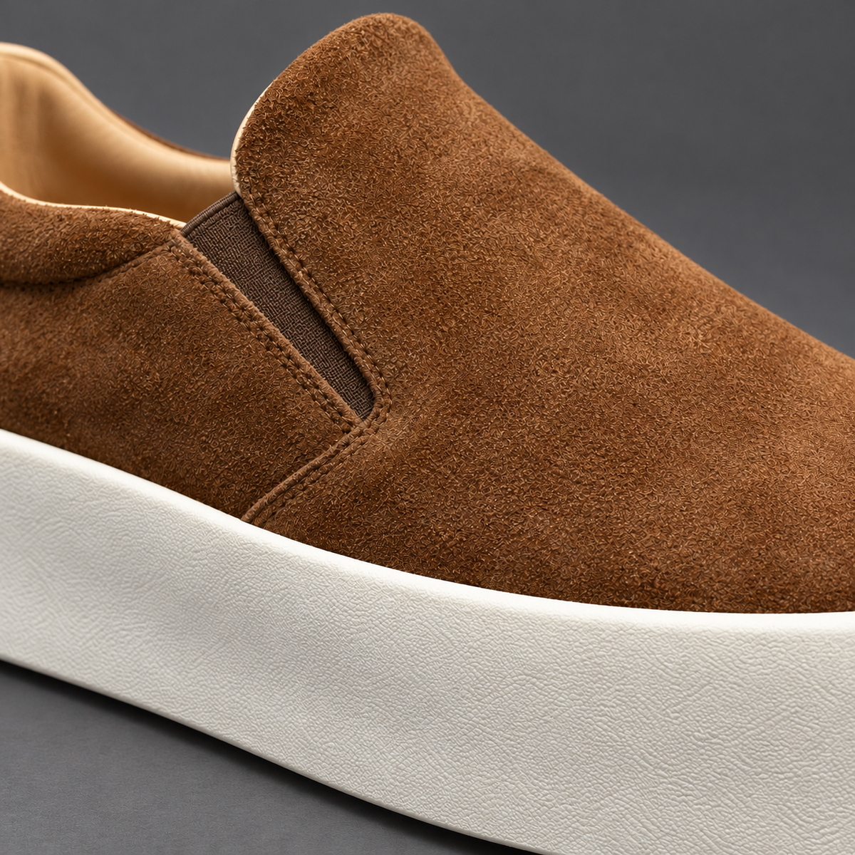 Lambskin square-toe Chelsea boot with a sculpted block heel and platform sole.